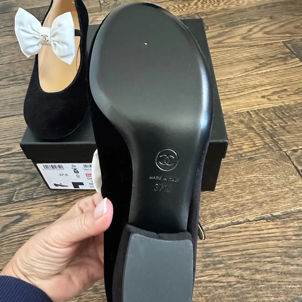 CHANEL Black velvet Mary Jane’s with White Bow